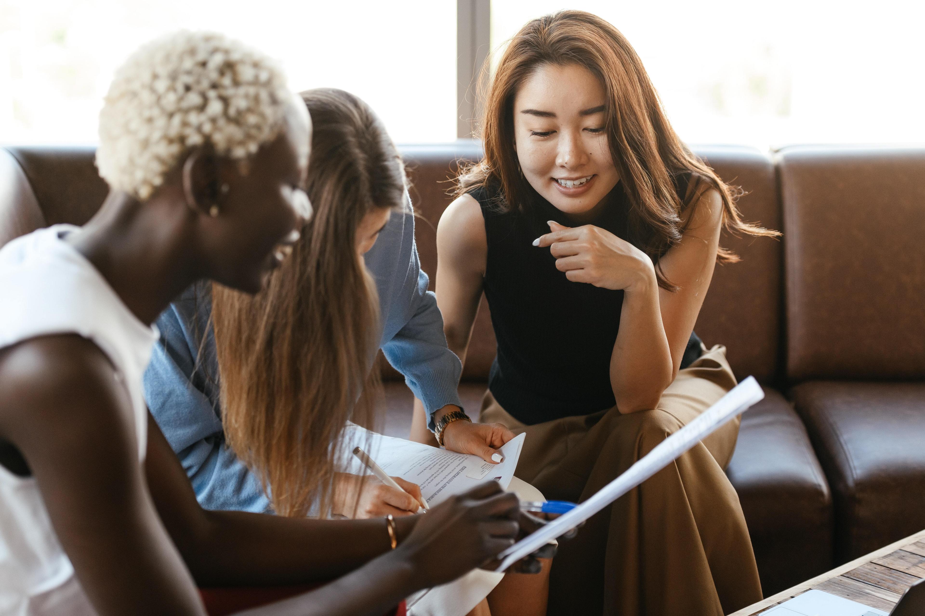 Homepage/three women working on couch.jpg